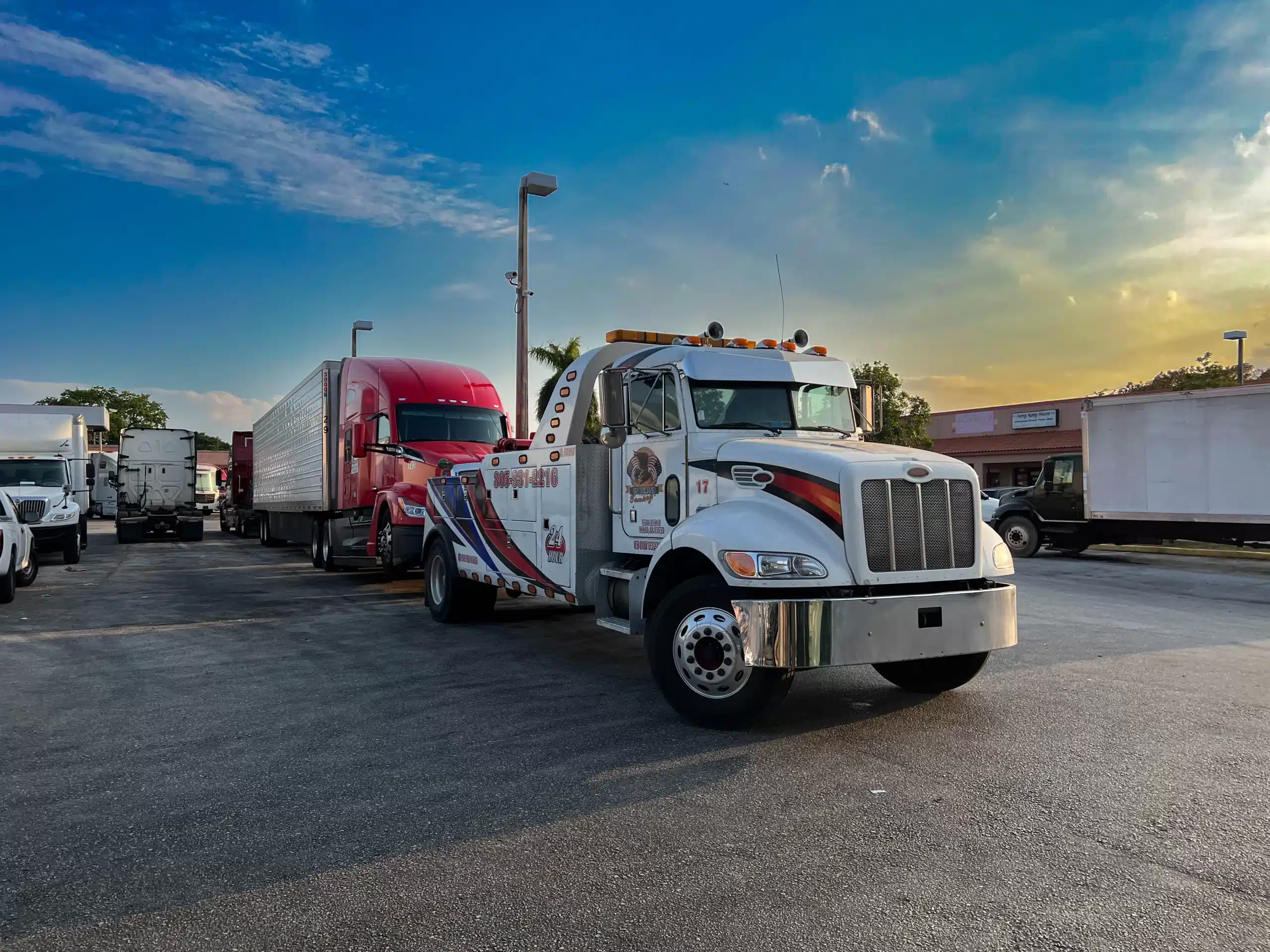 Heavy duty tow truck towing a semi truck.